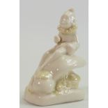 Belleek porcelain figure of a Pixie seated on toadstool: