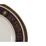 Royal Doulton tea set in the gilded Dorchester design: Comprising tea sets and plates.