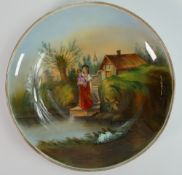 Continental hand painted shallow bowl: With lakeside decoration, unmarked, diameter 26.5cm.
