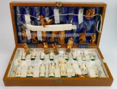 Cased Mid Century Chinese chess set: set of light and dark Chinese figures complete in folding box