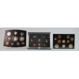 A collection of Royal Mint proof coins: Including 2004,2000 & 1990 UK proof coin collections,