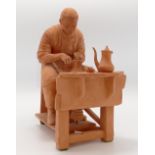 Peggy Davies original Terracotta studio model of a Potter: Signed to rear of chair,