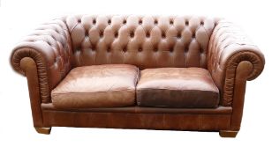 Leather Natuzzi branded brown Chesterfield type two seater Sofa: 74cm high x 100cm deep x 174cm