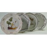 Four 19th century Tin glazed Dutch plates: Decorated in traditional styles: Diameter 23cm.