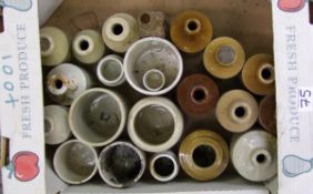 A collection of vintage stoneware bottles and jars: