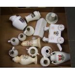 A collection of foreign shielded pottery items: