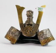 Japanese cast iron desk top Samurai helmet: with large brass maedate and embossed decoration, 23cm