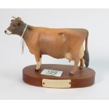 Beswick Jersey cow 1345: on a wooden plinth