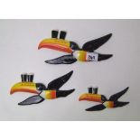 A set of three Carlton ware Guinness toucan wall plaques: