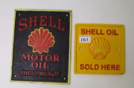 Two cast metal Shell advertising signs: