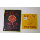 Two cast metal Shell advertising signs: