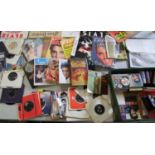 A large collection of Elvis ephemera : to include singles, books, collector club magazines,