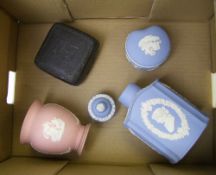 Wedgwood multi colored items to include: vases, lidded boxes etc , height of tallest 17cm