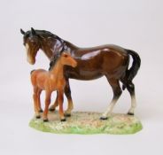 Beswick model of brown Mare and chestnut Foal: 953, on ceramic grassy base
