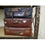 Three vintage suitcases: in stressed state