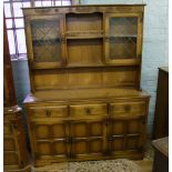 An oak veneered buffet sideboard/dresser.