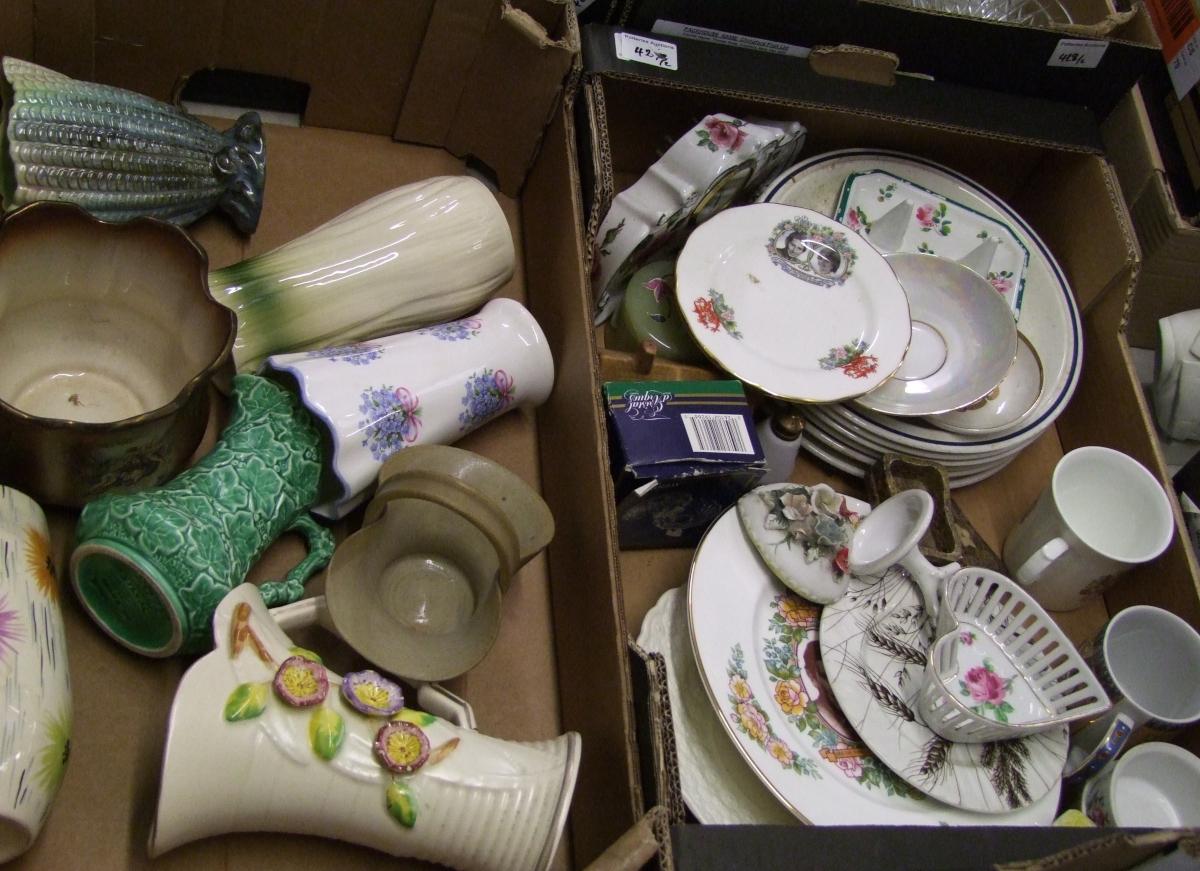 A mixed collection of items to include: decorative vases, commemorative items (2 trays).