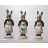 Royal Doulton Bunnykins figures to include: Nurse DB74A, 74B and 74 no cross (rare)(3)