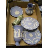 A collection of Wedgwood to include: wall plates, ewer, flared vase etc