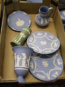 A collection of Wedgwood to include: wall plates, ewer, flared vase etc