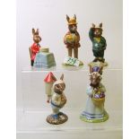 Royal Doulton Bunnykins figures to include: DB18 At The Easter Parade, DB19 Mrs Bunnykins at the