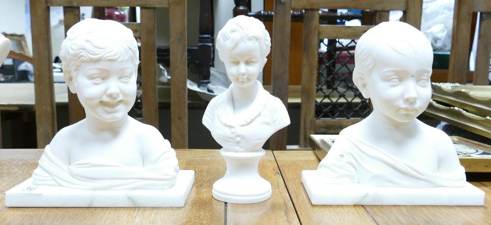 Three Resin Busts of Children: two with marble plinths, height of tallest 18cm(3)