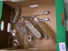 A collection of silver and silver lidded items to include: dressing table part set, glove