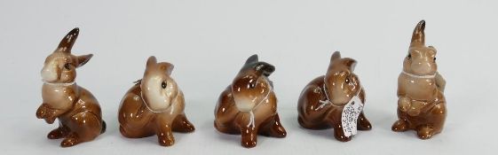 Beswick Rabbits to include: Three Scatching 824 together with two Haunching 823 (5)