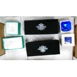 A collection of Oleg Cassini Boxed glass paperweights: together with Simon Design similar items