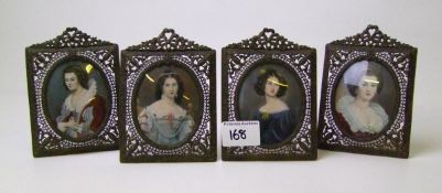 A set of four signed portrait miniatures: in Filigree brass frames
