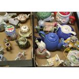 A mixed collection of items to include: Novelty Teapots(2 trays)