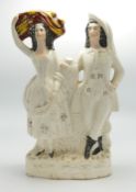 Large Staffordshire figure of couple carrying wheat: height 33cm