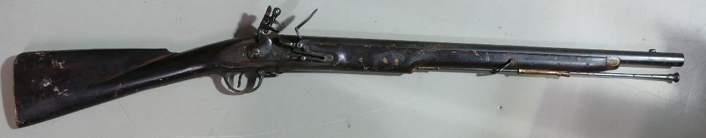 20th century Brownbess Flintlock Carbine: Tower GR crown to lock, ordinance marks to barrel.