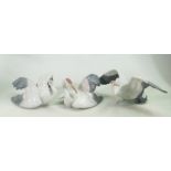 Three Lladro small crane figures Fluttering, nesting and landing cranes - model numbers 1598,1599, &