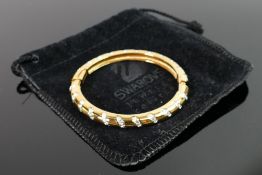 Swarovski gold plated bangle: set with faux diamond style stones.