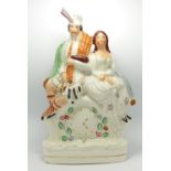 Large Staffordshire Figure of Scottish Couple Sat Upon Clock: height 37cm