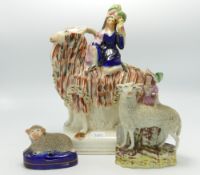 Staffordshire Figure of Girl Riding Goat(neck repaired), Girl with Sheep & Lamb: height of tallest
