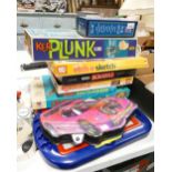 A collection of boxed vintage games to include: Ker Plunk, Etch a sketch, Operation etc