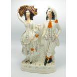 Large Staffordshire figure of couple carrying wheat: height 33cm