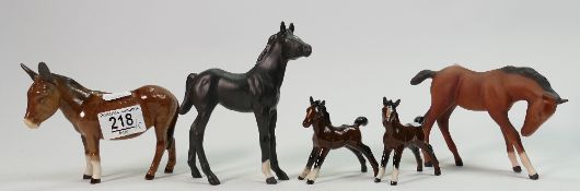 Beswick & Royal Doulton foals:997 x2 , matt 947, A2466 together with Donkey 1364(5)
