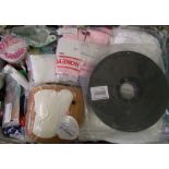 A mixed collection of items: chair covers, beauty products, fabric etc (1 tray).