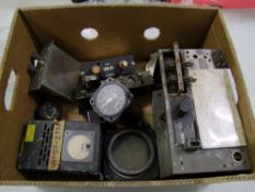 A collection of Military Aircraft Parts to include: radio transmitter, dials etc
