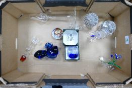 A mixed collection of glass items to include: Sylshire & similar paperweights, Clear Crystal Eggs,