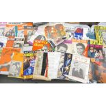 A collection of magazines, tab books, programs & books