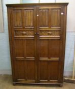 Early 20th Century oak linen fold two door wardrobe: Height 189cm x 127cm wide x 55cm deep