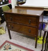 Edwardian chest of two drawers: raised on square supports.