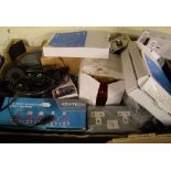 A mixed collection of electrical items: down lights, adapters, sockets etc.