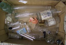 A collection of Vintage glass measuring cylinders, Laboratory bottles, Medicine bottles, false teeth