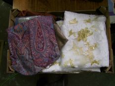 A mixed collection of items: Islamic themed clothing, scarves etc (1 tray).
