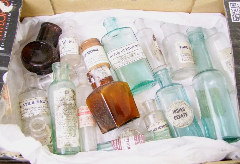 A collection of small vintage pharmacy bottles: 20